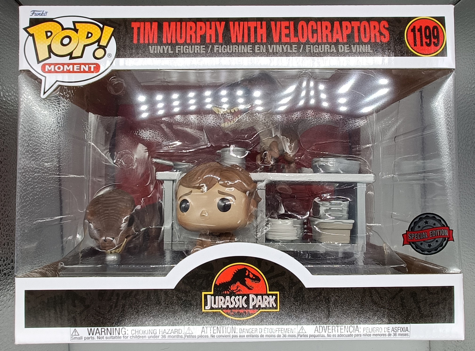 Funko Pop! Movie Moment: Jurassic Park Tim Murphy with Velociraptors V